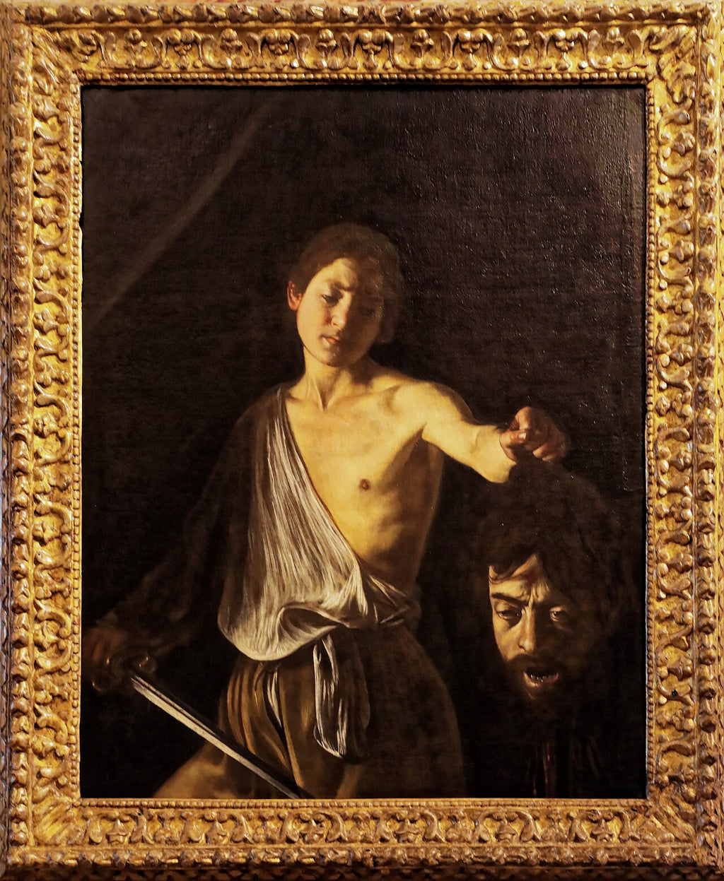 David with the Head of Goliath - Caravaggio