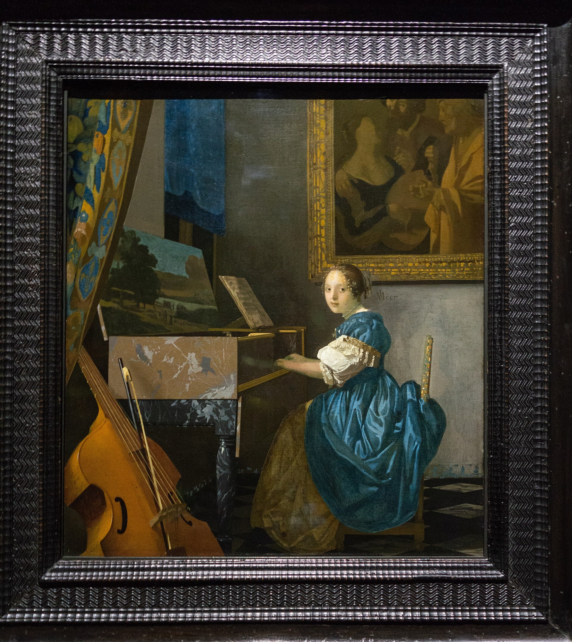 Young Woman Playing the Virginal - Johannes Vermeer
