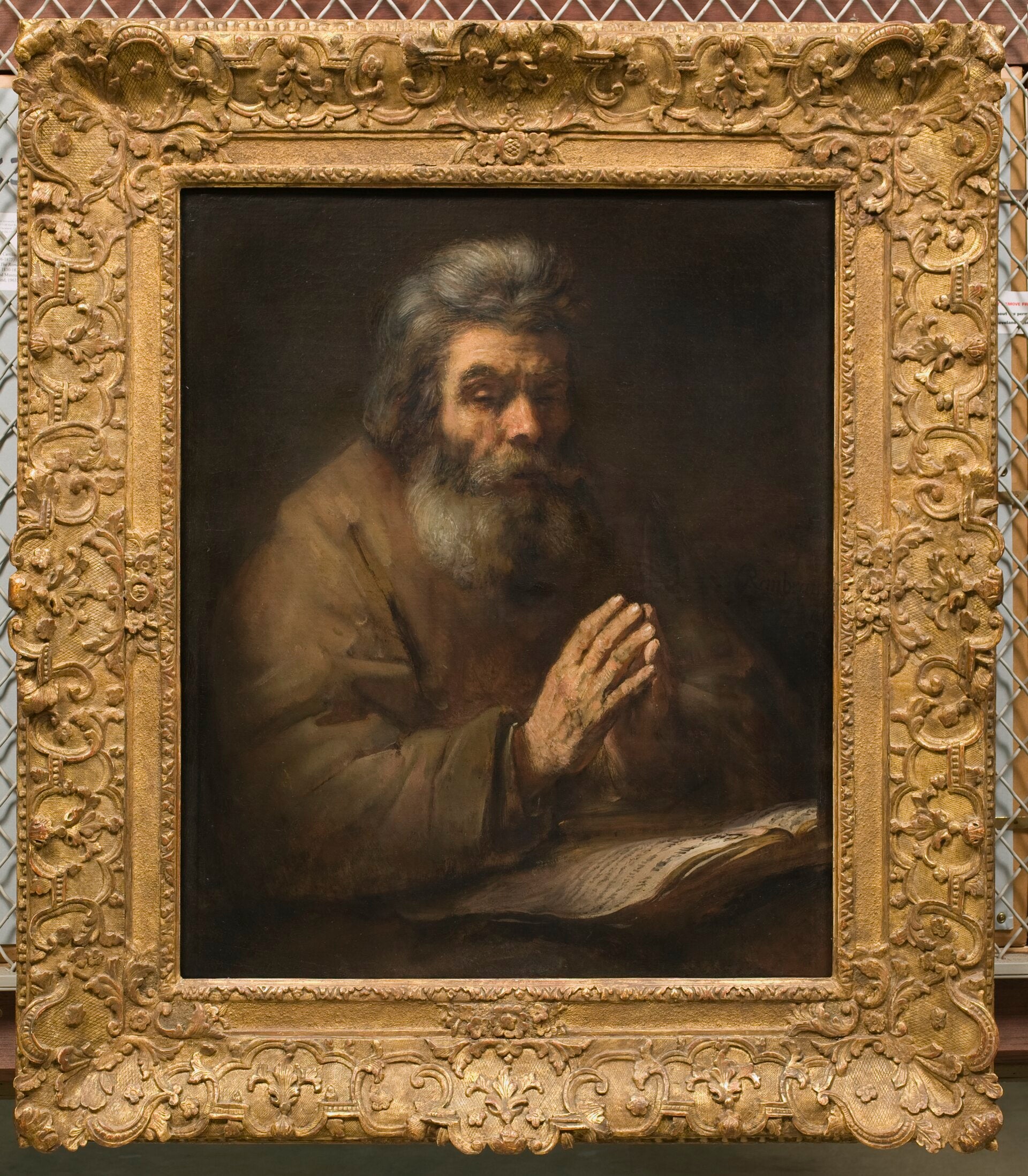 An Elderly Man in Prayer - Rembrandt