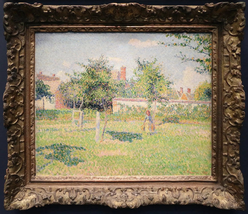 Woman in a garden, spring sun in the meadow at Éragny - Camille Pissarro