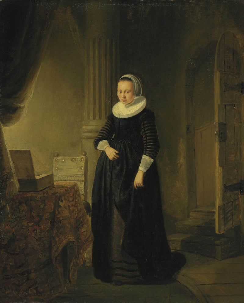 Portrait of a woman, standing full-length in an interior - Rembrandt