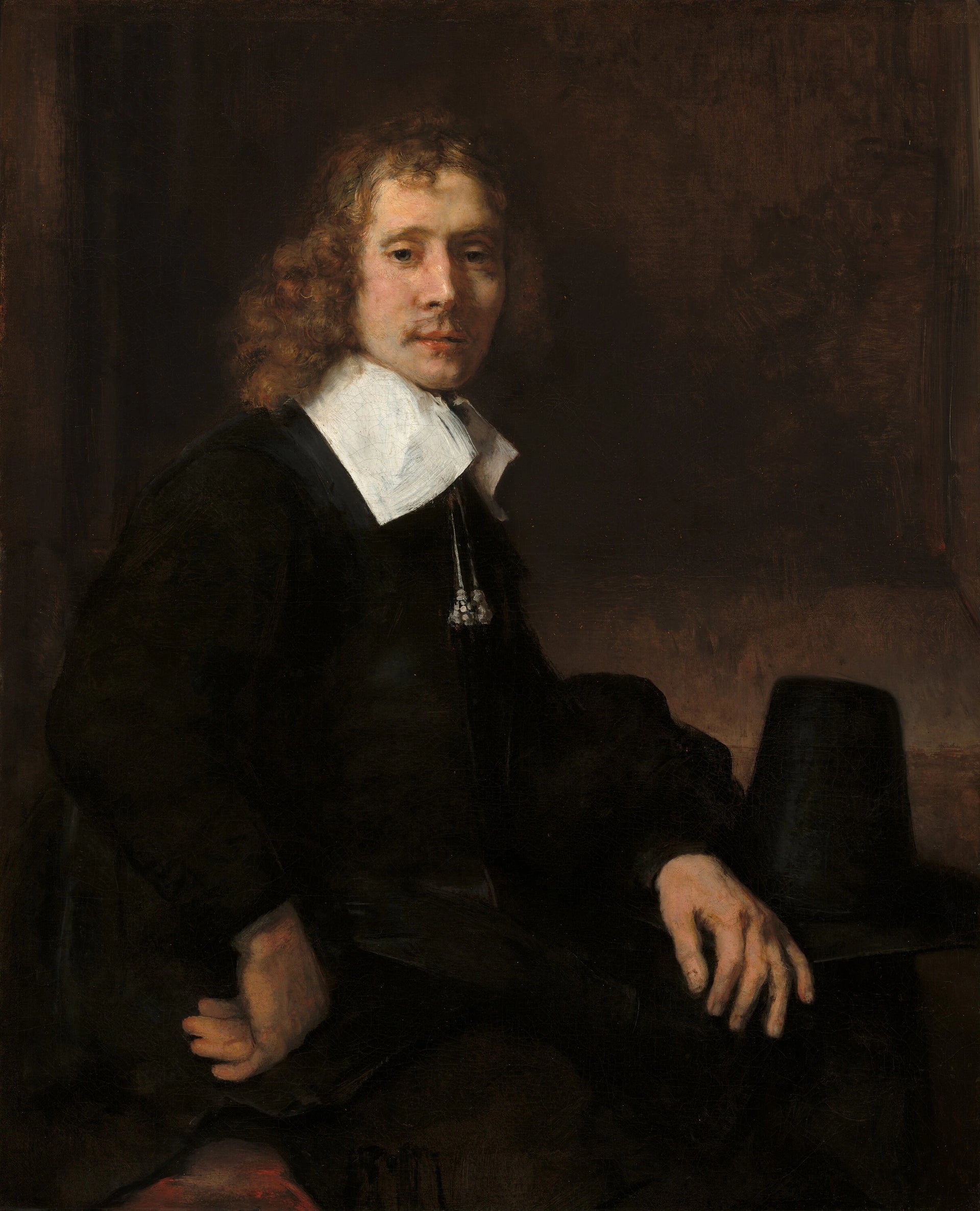 Jeune homme assis à une table — Rembrandt, vers 1660, National Gallery of Art