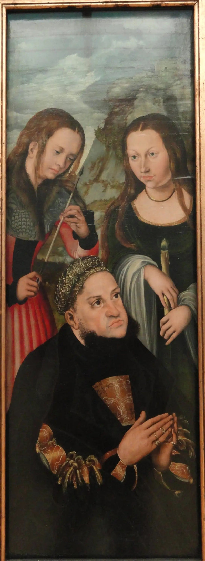 The Elector Frederick the Wise of Saxony (1463-1525) with the Holy Ursula (on the left) and Genevieve (on the right) - Lucas Cranach the Elder