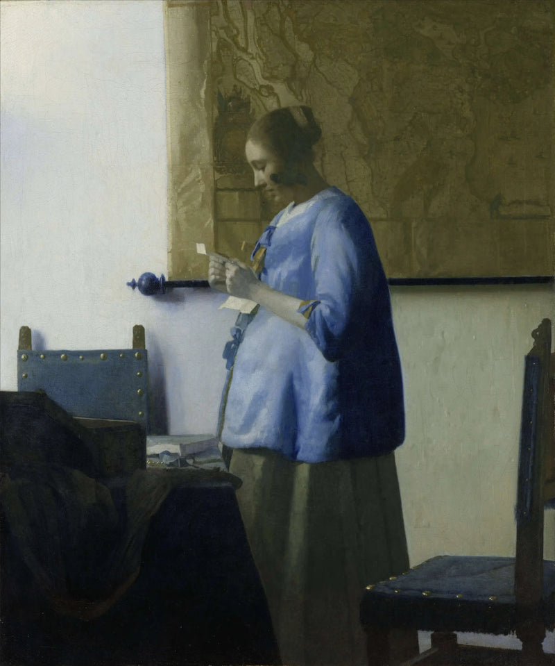 The Woman in Blue Reading a Letter - Johannes Vermeer