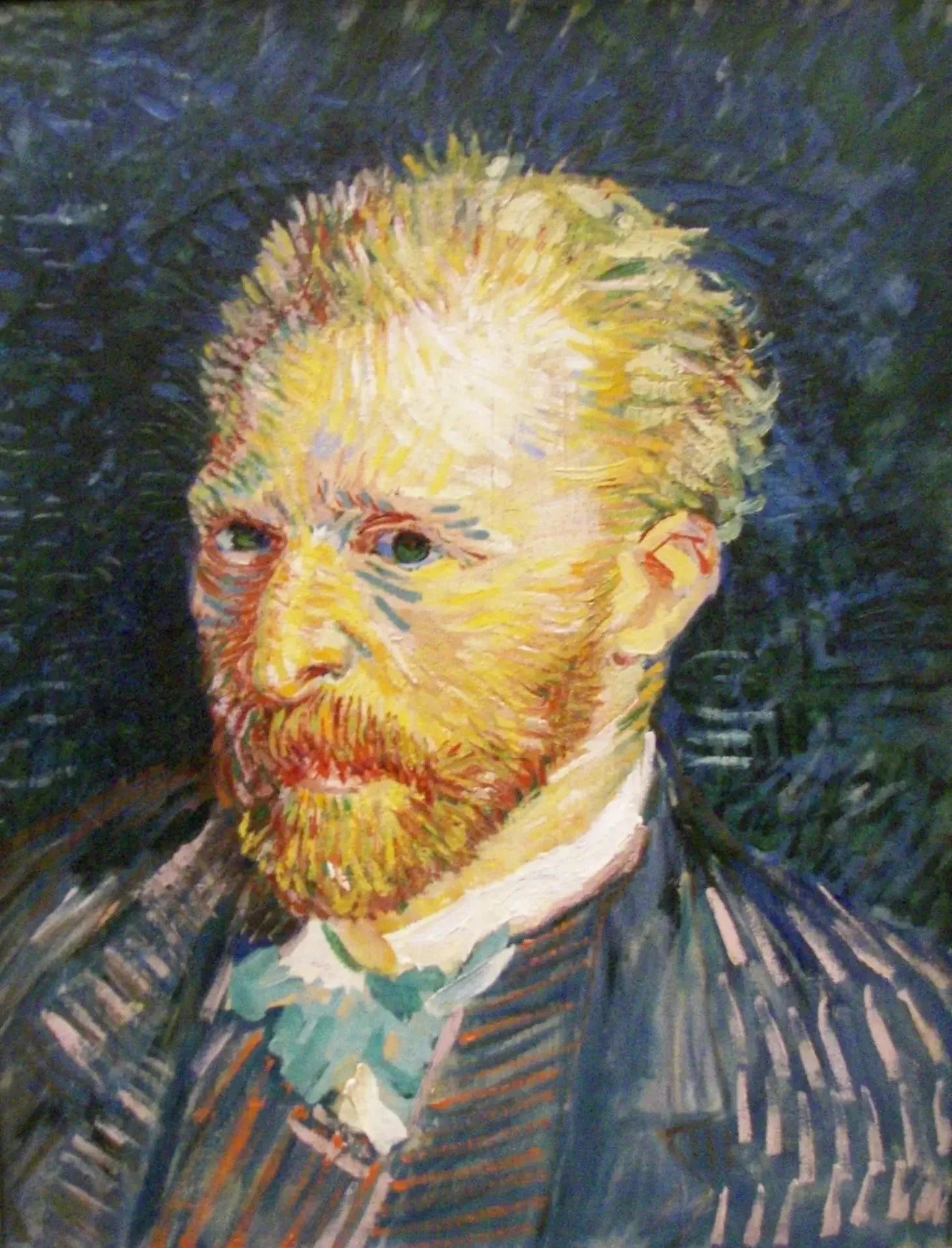 Portrait de l’artiste, F320 — autoportrait de Vincent van Gogh devant un fond bleu nuit
