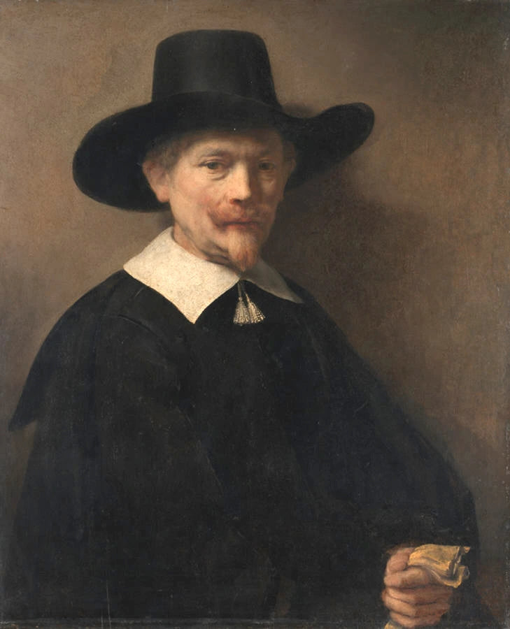 Portrait of a man with gloves in hand - Rembrandt