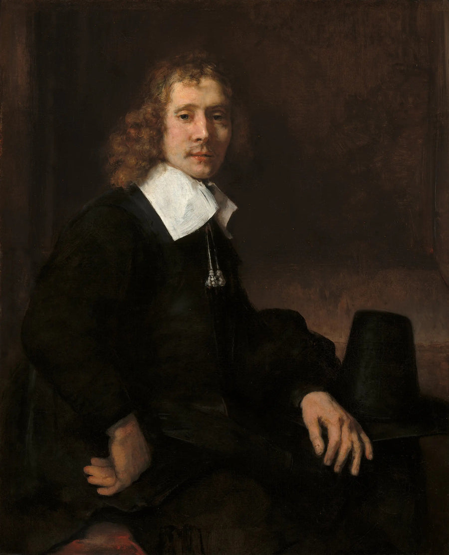 A Young Man Sitting at a Table (Perhaps Govaert Flinck) - Rembrandt