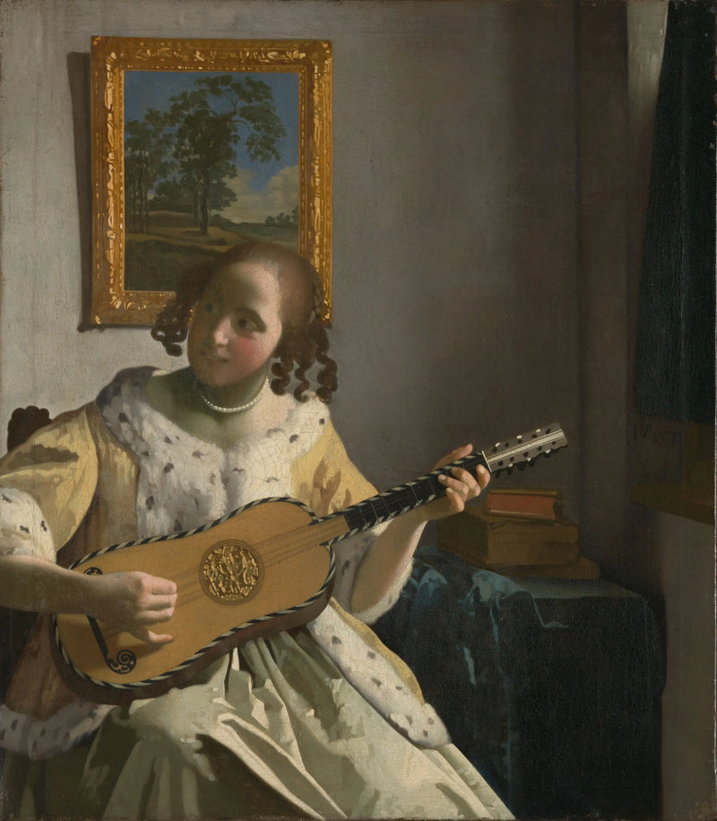A woman playing the guitar - Johannes Vermeer