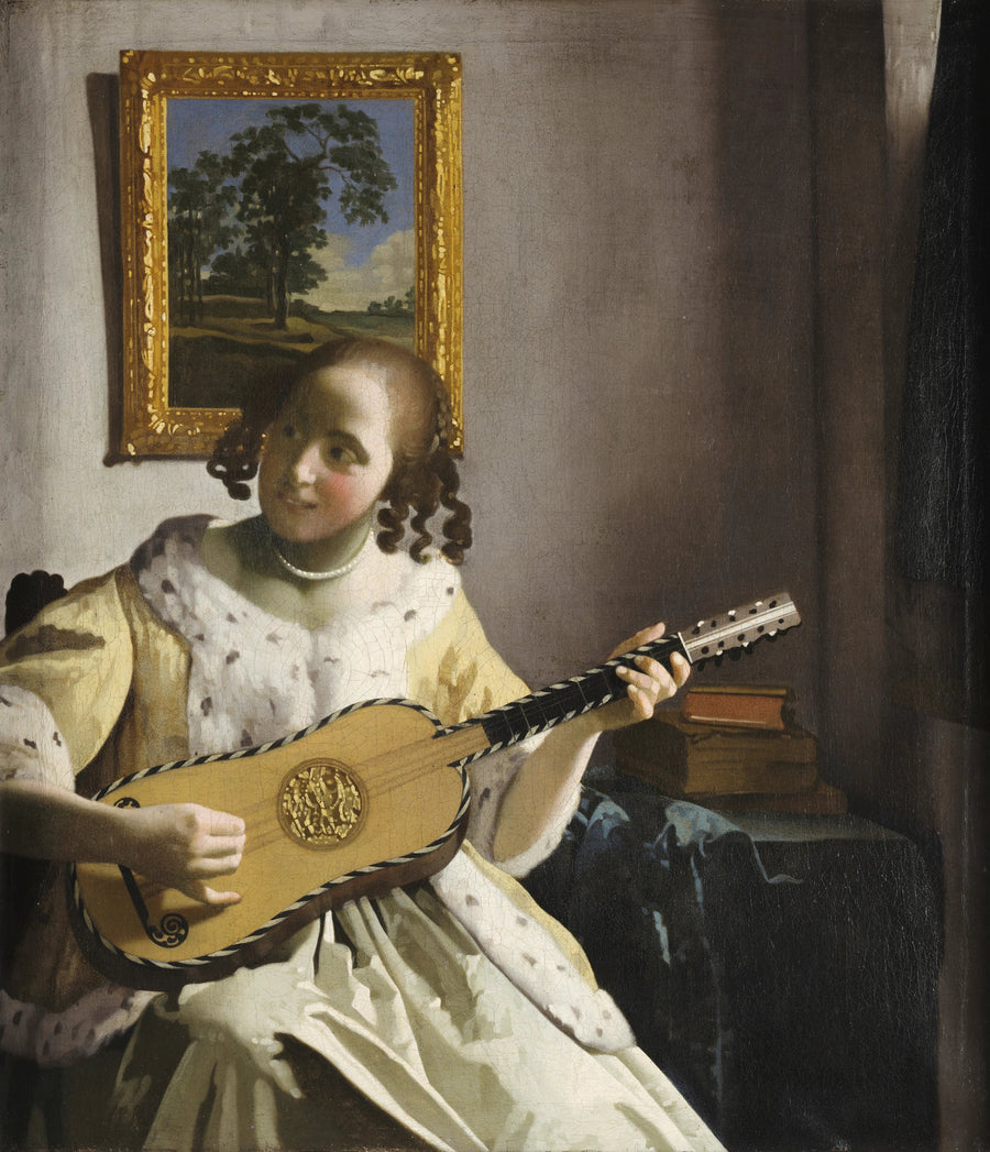 A woman playing the guitar - Johannes Vermeer