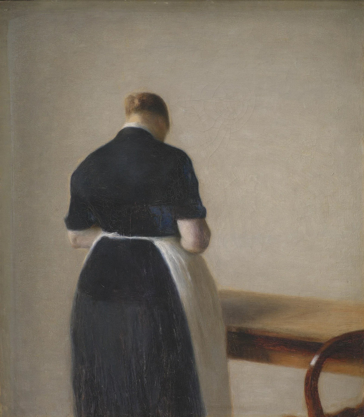 Woman seen from behind - Vilhelm Hammershøi